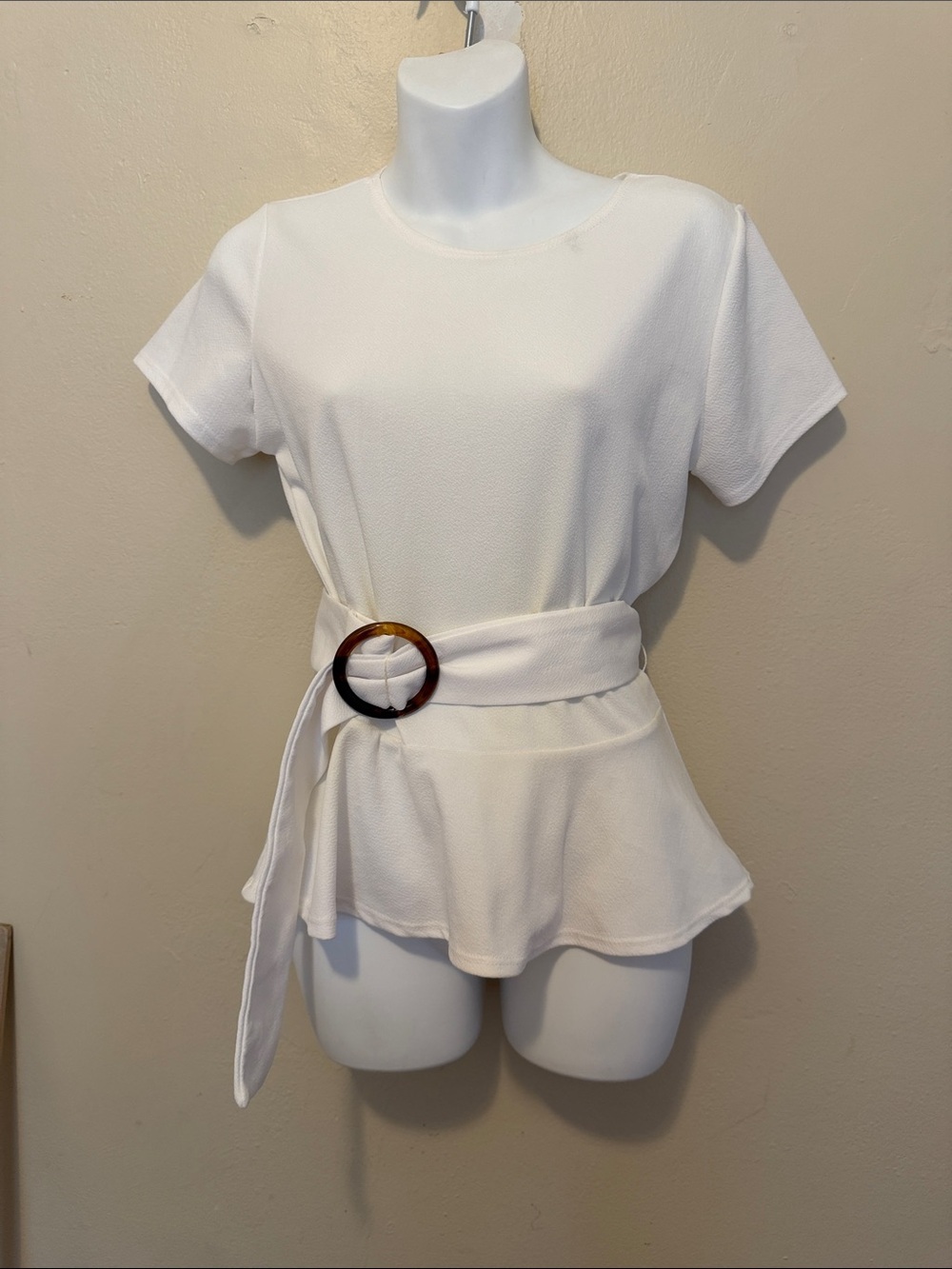 Discreet White Short-Sleeve Peplum Top with Waist Tie
